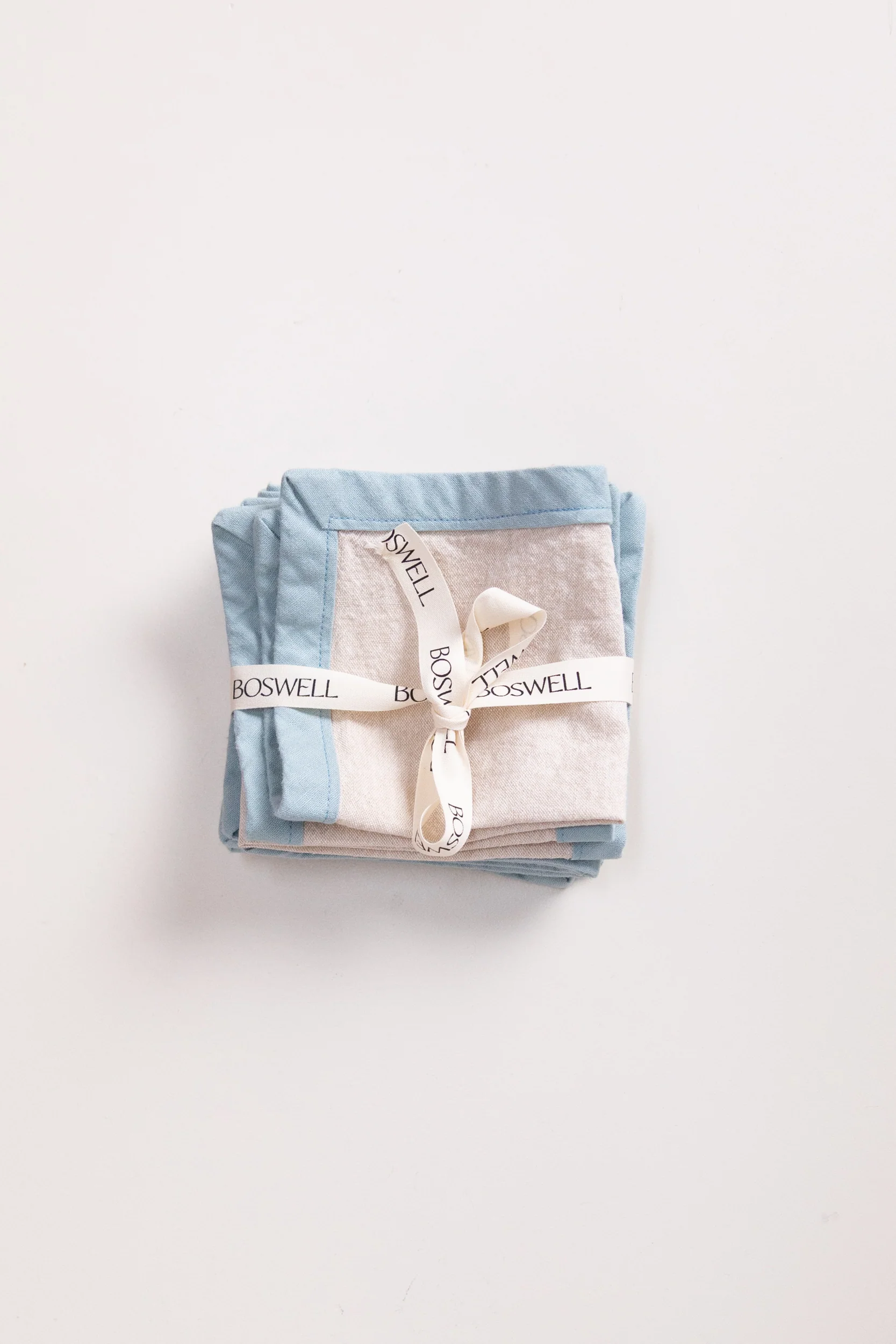EDGED COCKTAIL NAPKINS IN CREAM LINEN - SET OF FOUR