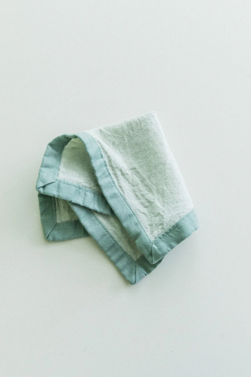 EDGED COCKTAIL NAPKINS IN MOSS LINEN - SET OF FOUR - Image 3